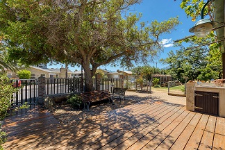 Farmhouse-Front-deck-and-Outside-Sitting-Area